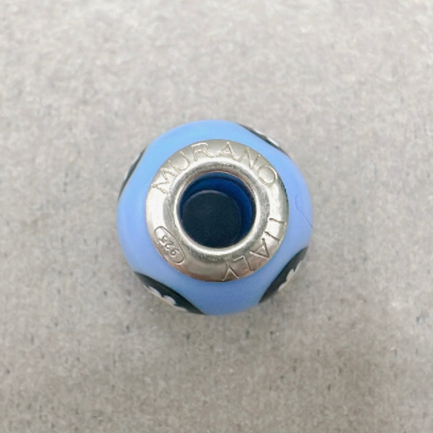 Murano daisy blue background