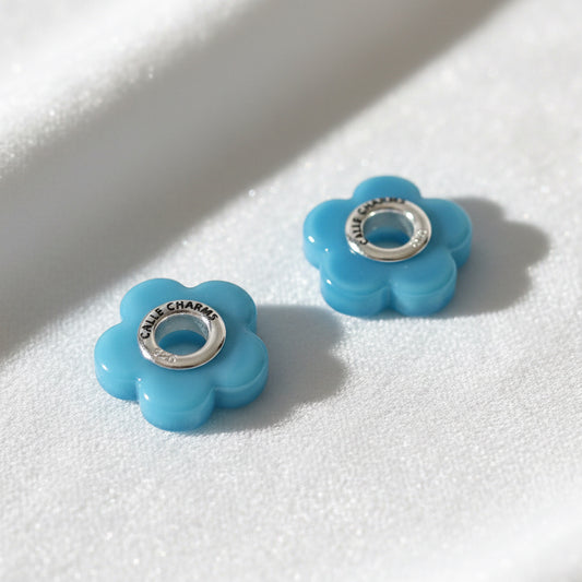 Par de flores de cristal azul