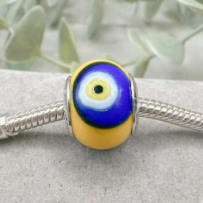 Murano Turkish Evil Eye yellow background