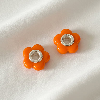 Par de flores de cristal naranja