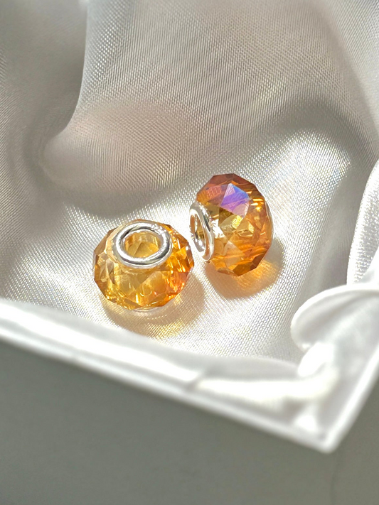 Par Charms Ámbar tornasol